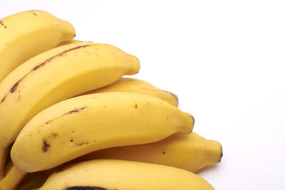 Close-up of lemon against white background