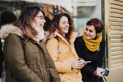 Young woman using smart phone