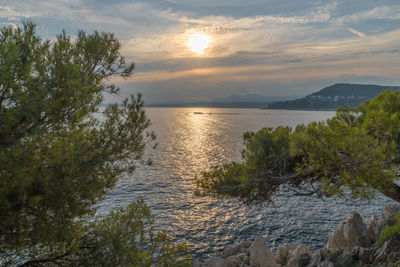 Scenic view of sea against sky during sunset