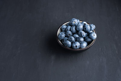 High angle view of fruits in bowl on table