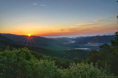 Scenic view of mountains against sky during sunset