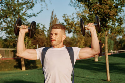 Man exercising at park