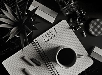 High angle view of coffee cup on table