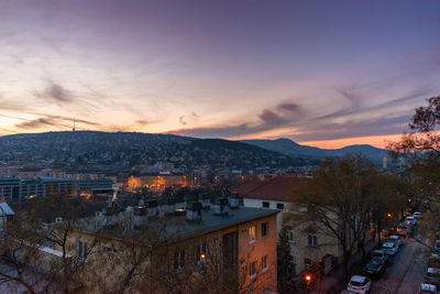 High angle view of townscape against sky at sunset