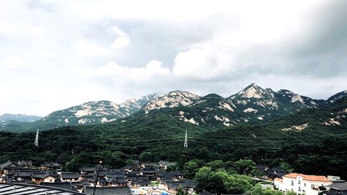 Scenic view of snowcapped mountains against sky