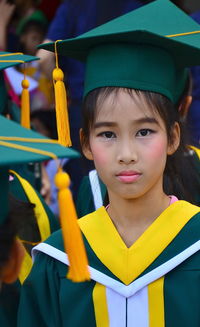 Portrait of cute girl standing outdoors