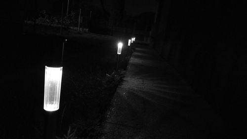 Illuminated street lights at night