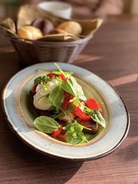 Close-up of salad in bowl on table