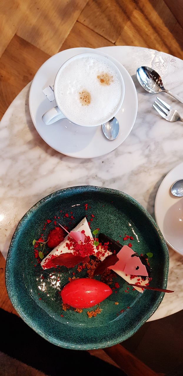 HIGH ANGLE VIEW OF DESSERT ON TABLE