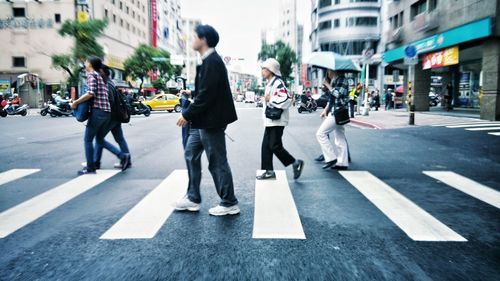 People walking on city street