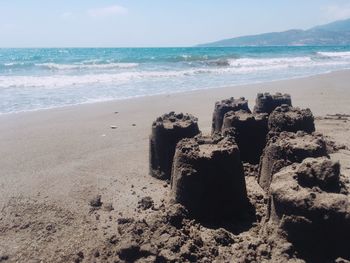Scenic view of beach against sky