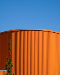 Low angle view of building against blue sky