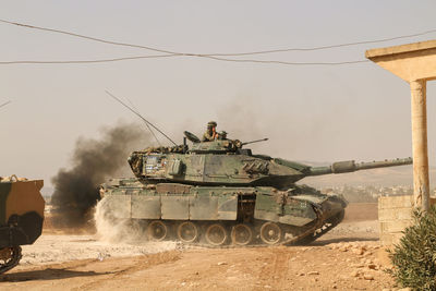Men in armored tank