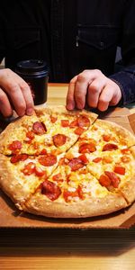 Midsection of man preparing food