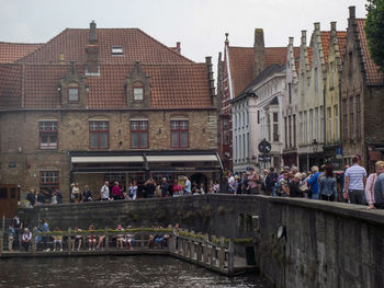 Group of people in city buildings