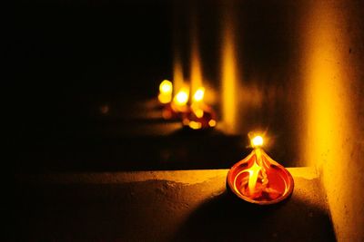 Close-up of illuminated christmas lights on table