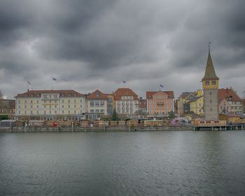 View of buildings against cloudy sky