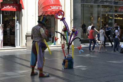 People on street in city