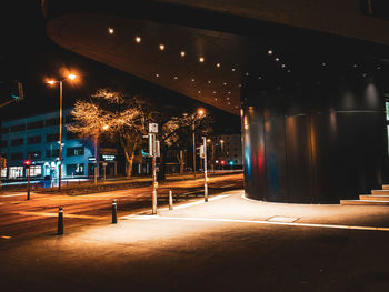 Illuminated street lights at night