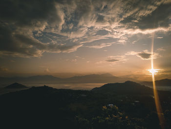 Scenic view of mountains against sky during sunset