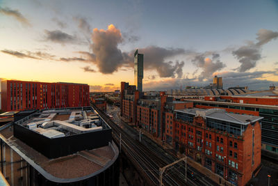 Cityscape against sky during sunset