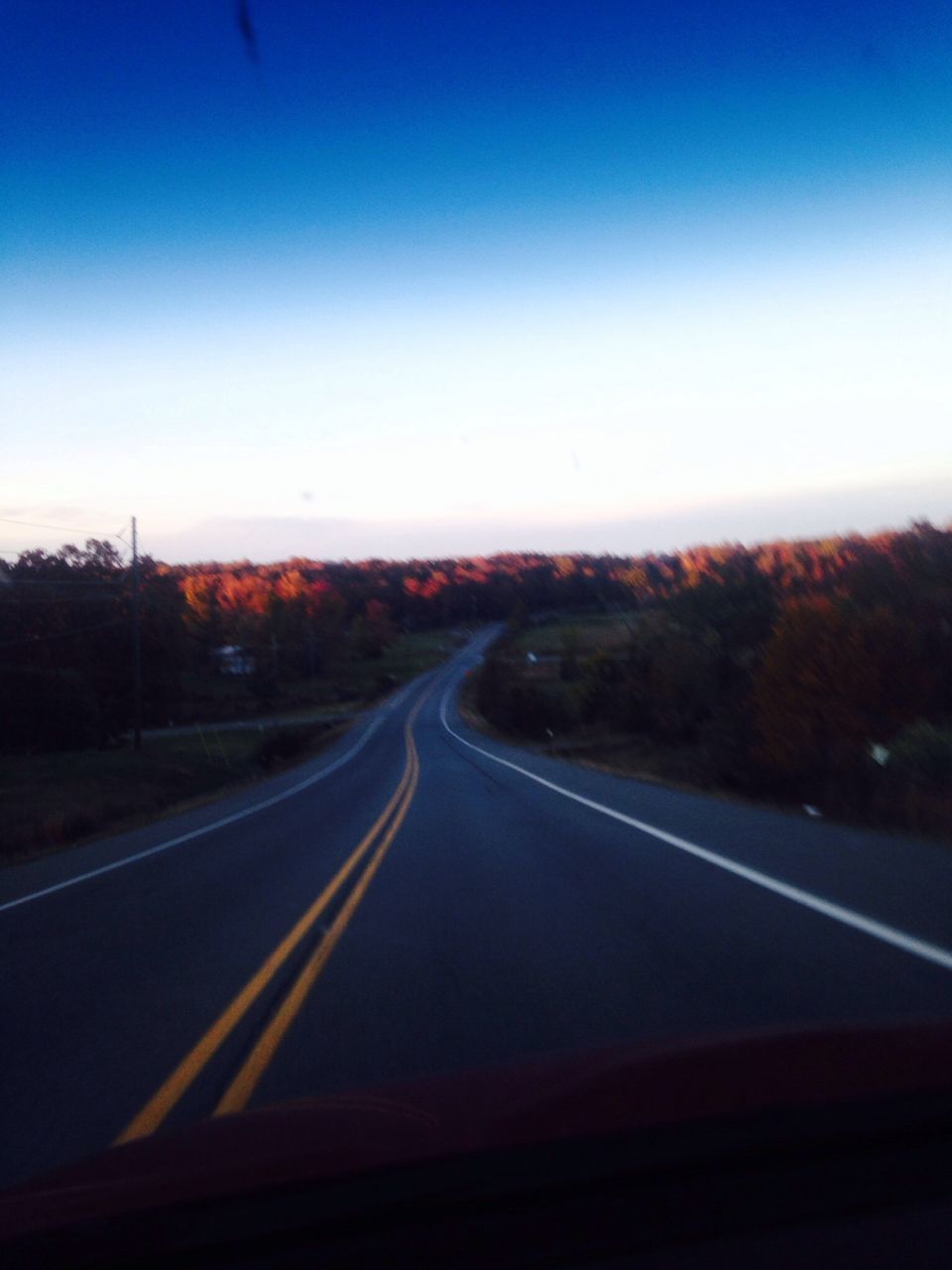 transportation, road, the way forward, diminishing perspective, clear sky, vanishing point, road marking, mode of transport, country road, car, sky, land vehicle, landscape, copy space, on the move, tranquil scene, long, tranquility, nature, travel