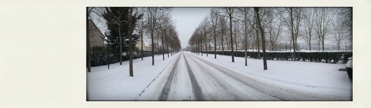 snow, winter, cold temperature, season, the way forward, tree, weather, diminishing perspective, covering, bare tree, vanishing point, nature, tranquility, transportation, tranquil scene, covered, road, frozen, white color, long