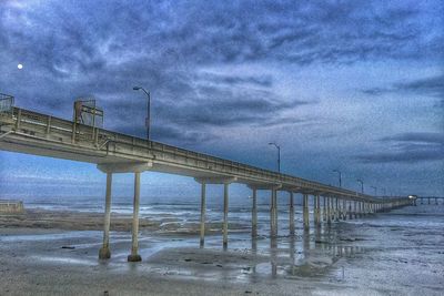 Low angle view of pier over sea
