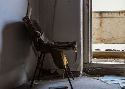 Empty abandoned chair at home