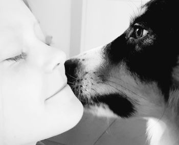 Close-up of woman with dog