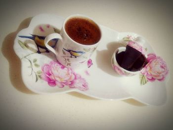 Close-up of coffee cup on table