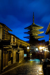 Illuminated buildings in city at night