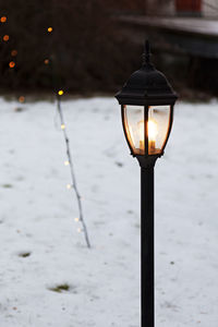 Close-up of illuminated street light