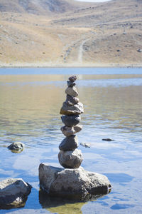 Stack of pebbles in water