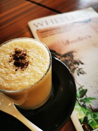Close-up of coffee cup on table
