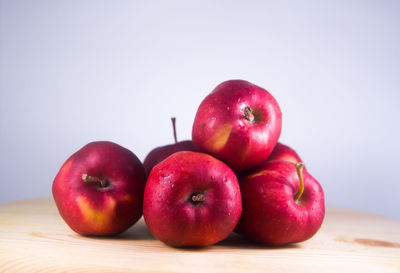 Close-up of apples on table