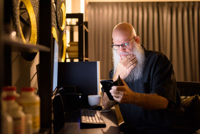 Man using laptop on table