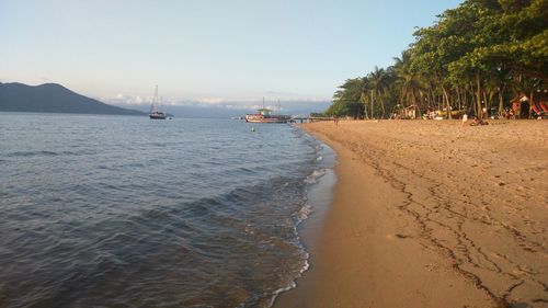 Scenic view of beach against sky