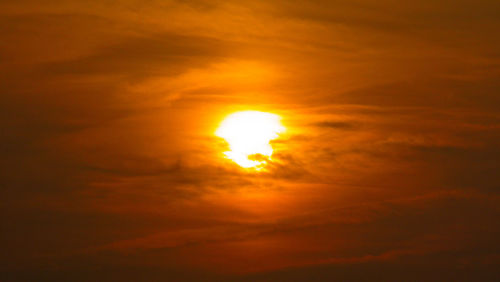 Low angle view of dramatic sky during sunset