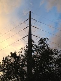 Low angle view of electricity pylon