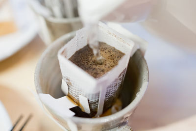 High angle view of coffee cup on table