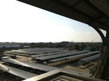 High angle view of train in city against sky