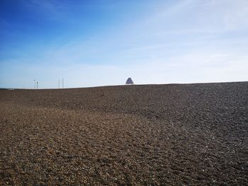 Scenic view of desert against sky