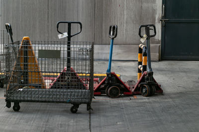 Bicycles on road by building