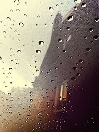 Close-up of water drops on glass window