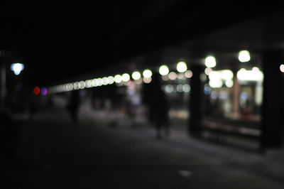 Defocused image of illuminated lights at night