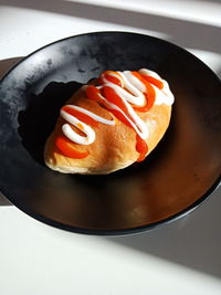 High angle view of bread in plate on table