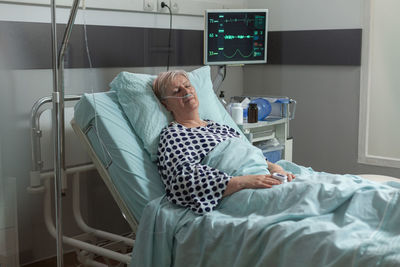 Man lying down on bed