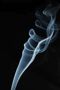 Close-up of light painting against black background