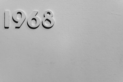 Close-up of text on wall